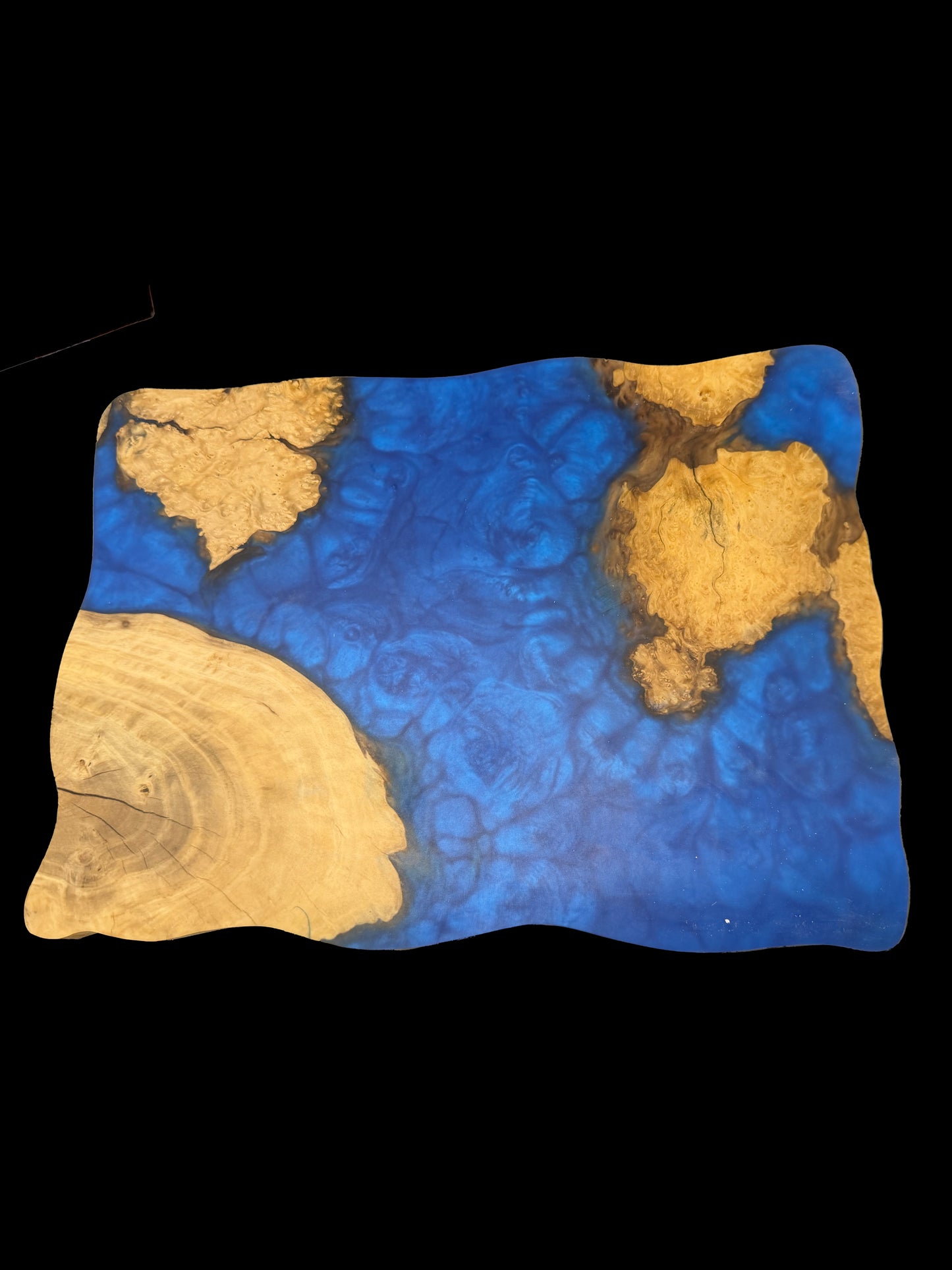 Blue epoxy wood board with burl